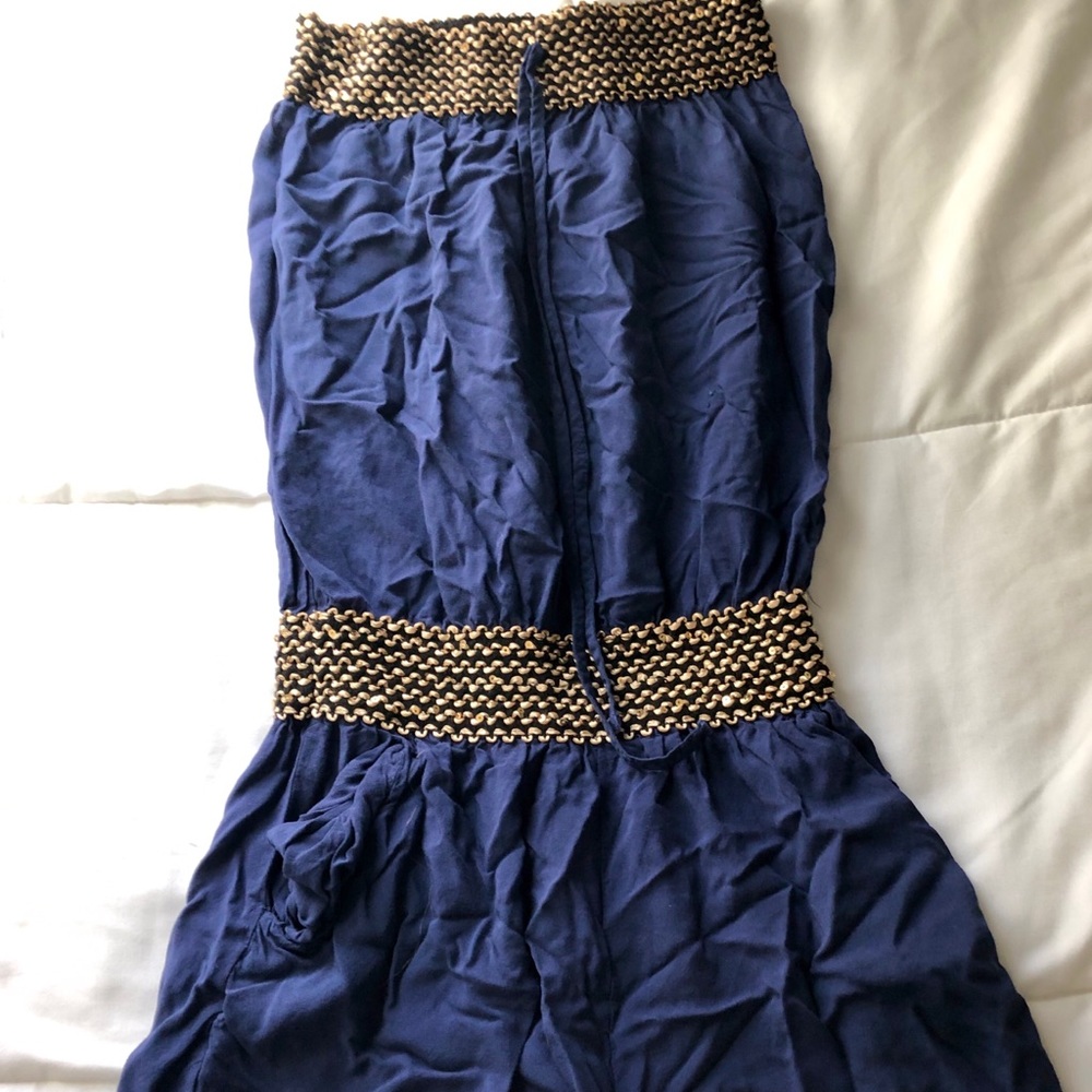Blue romper/jumpsuit with gold accent waistline